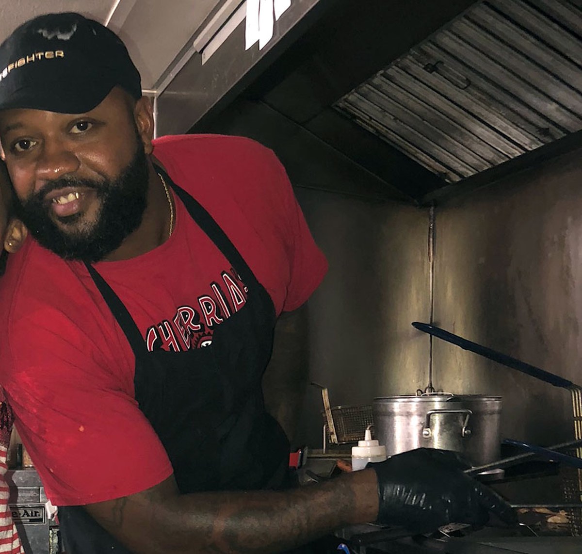 Chef Willie Williams at work in his food truck kitchen — Savour Downtown
