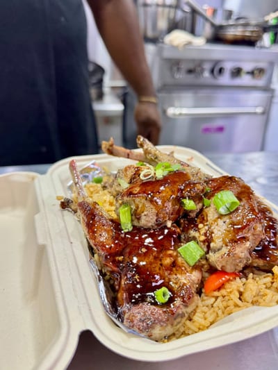 Cook'd — jerk lamb chops with green onions over yellow rice